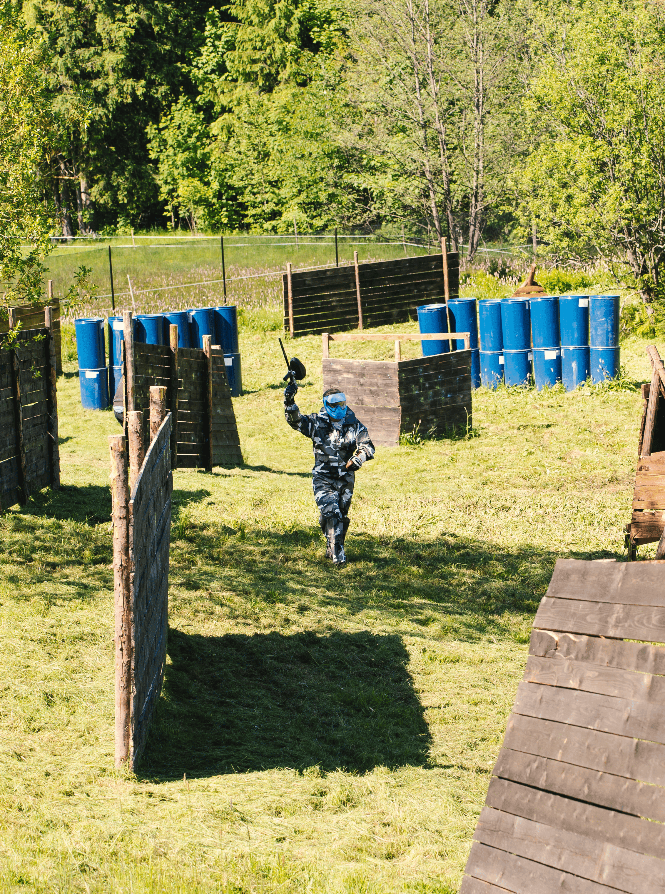 Players in full paintball gear
